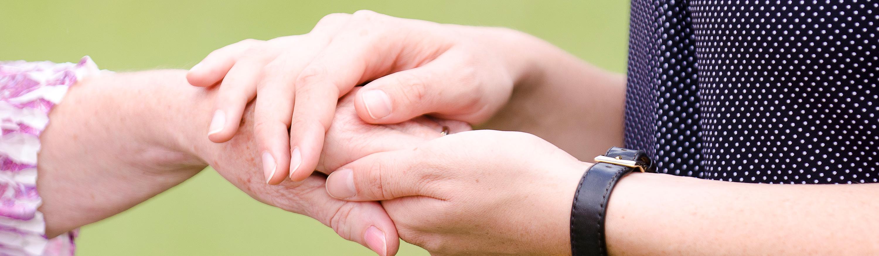 Close up of hands representing care – RSl Care
