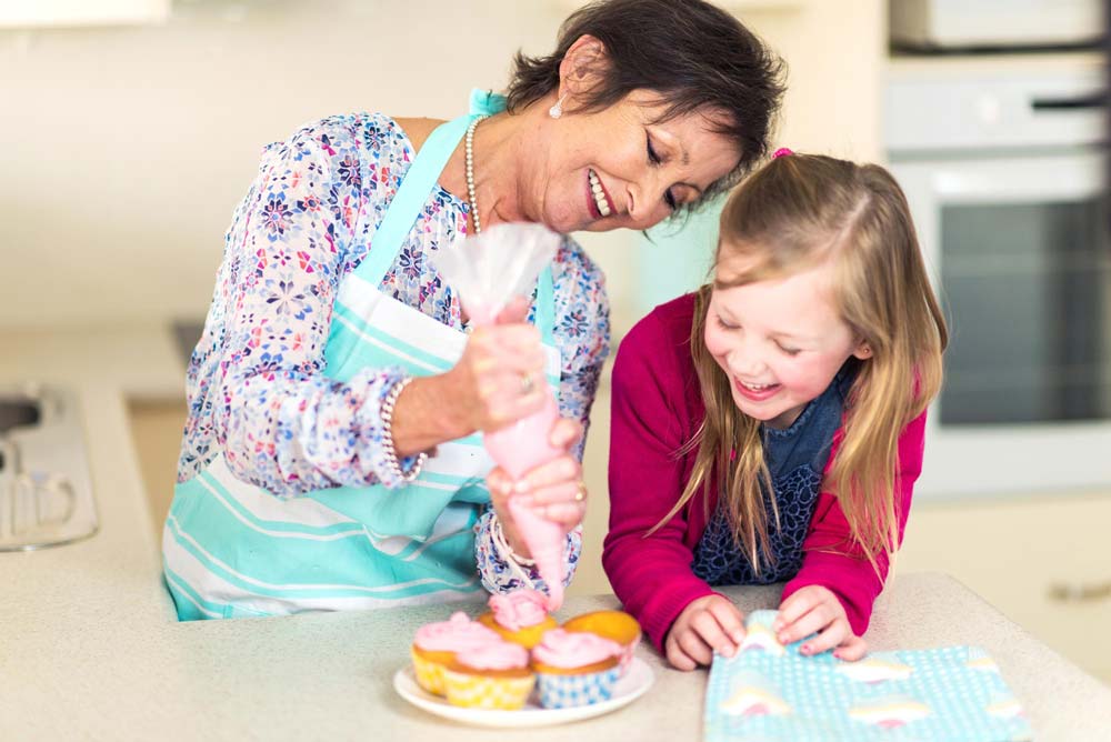 Adelene Retirement Village - Making cupcakes with grandmother